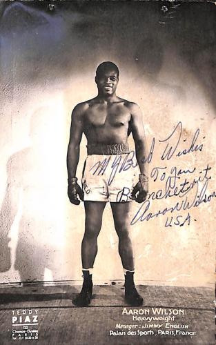 Carte postale dédicacée par Aaron Wilson.